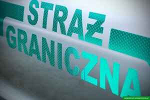 Napis Straż Graniczna na drzwiach samochodu. Napis Straż Graniczna na drzwiach samochodu.